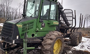 Форвардер John deere 1010